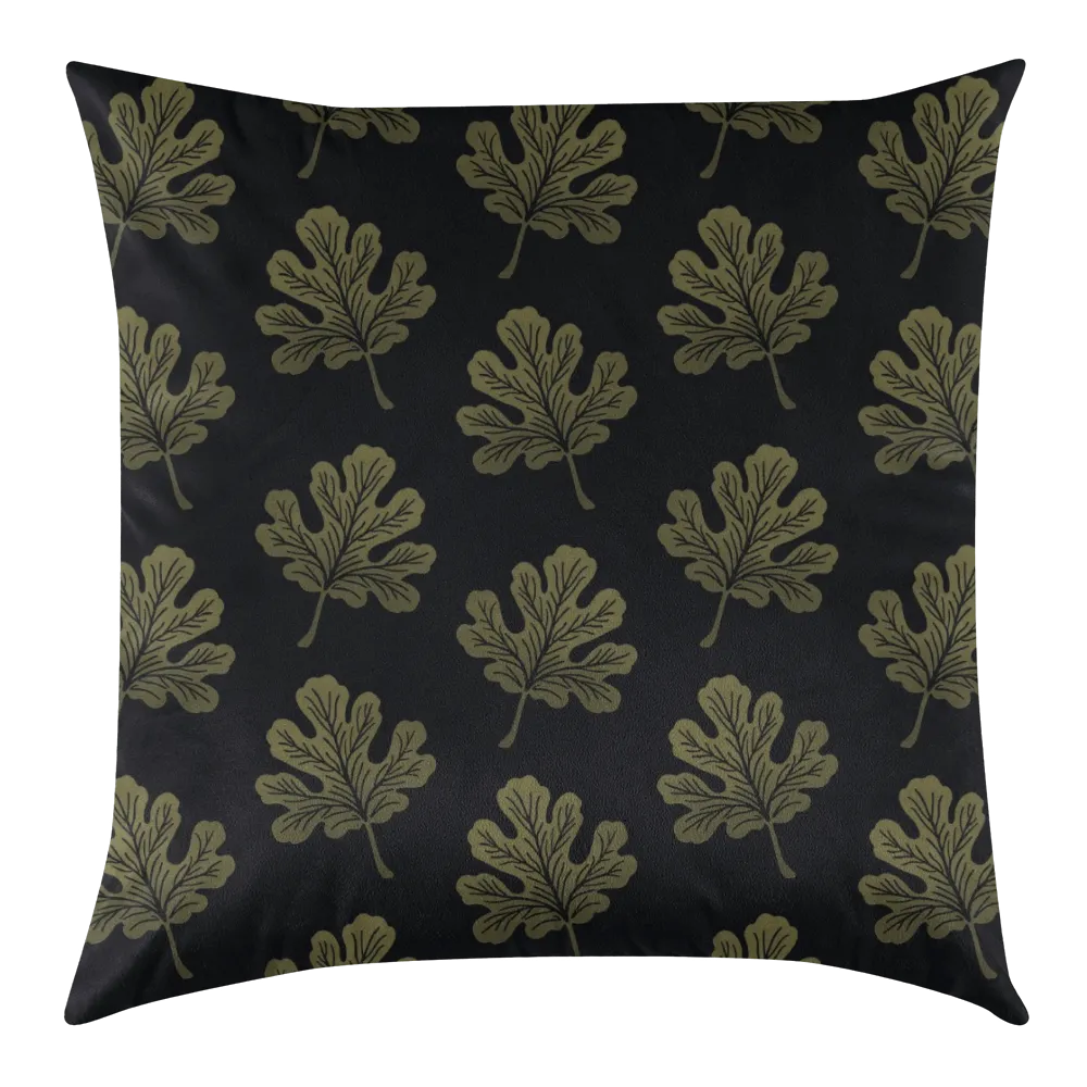 Pillow with leaf pattern on a black background
